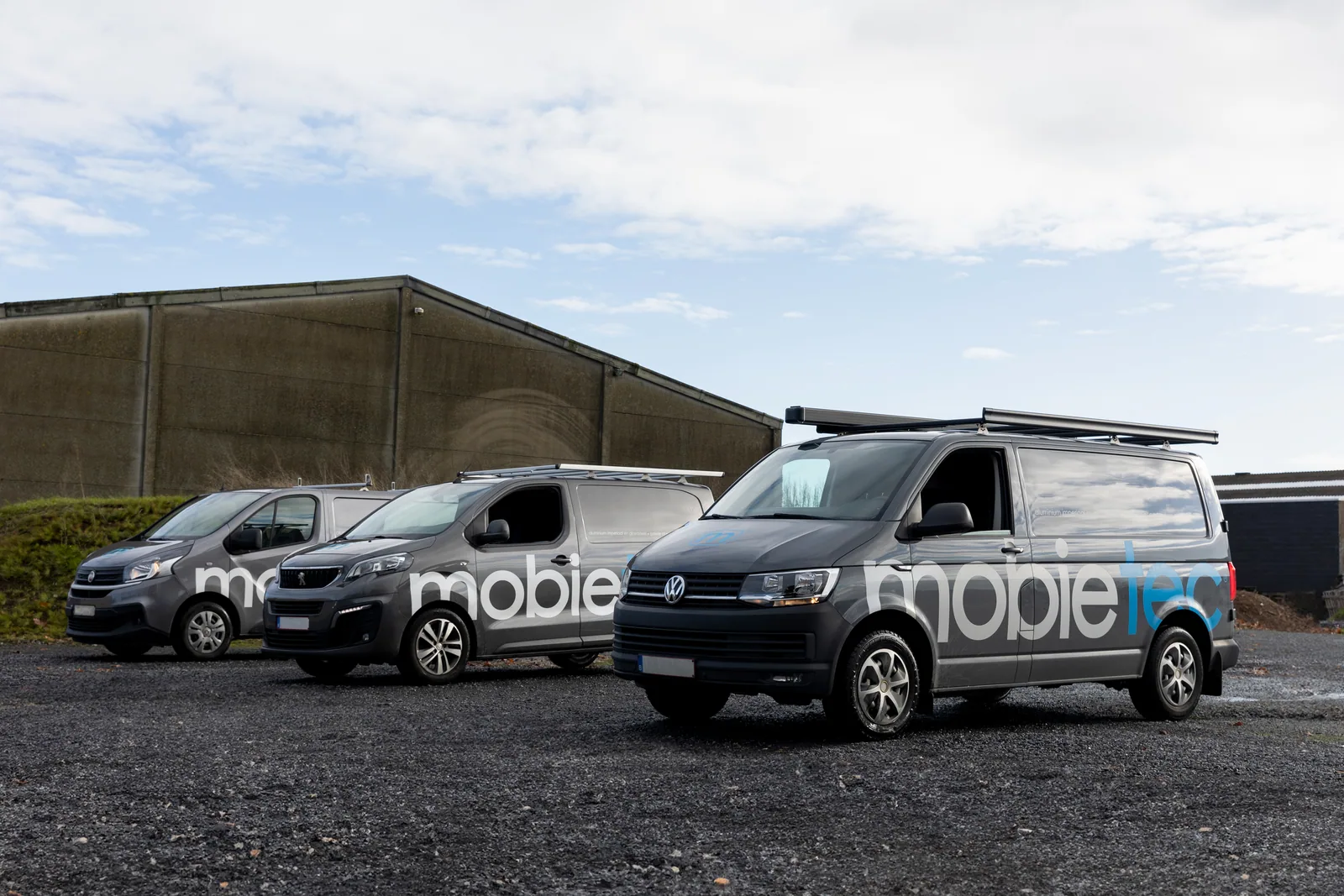 Vans with Mobietec roof racks and glass racks